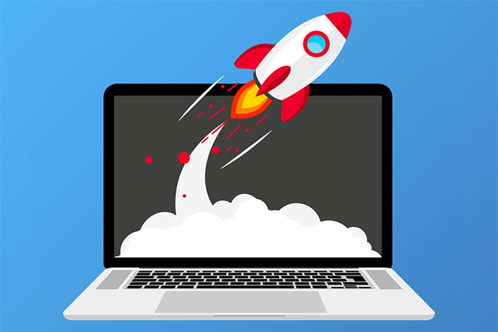 illustration of laptop and rocket